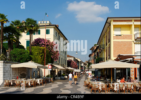 Bars and ice cream shops along the lakeside promenade in Lazise on Lake Garda, Lago di Garda, Veneto region, Italy, Europe Stock Photo