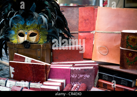 Leather-bound notebooks, mask, flea market, Portobello Road, London, England, United Kingdom, Europe
