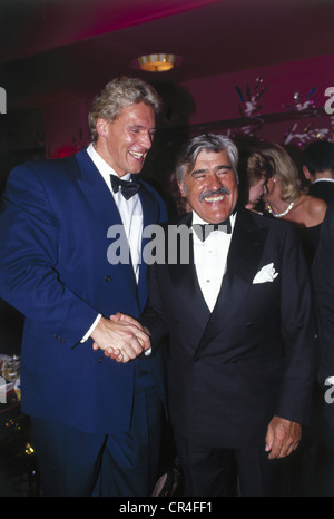 Adorf, Mario, * 8.9.1930, German actor, half length, with Ralf Möller, German film ball, Hotel Bayerischer Hof, Munich, 1990, Stock Photo