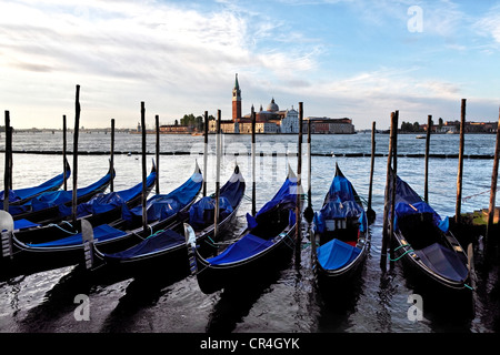 Gondolas, San Giorgio Maggiore church at back, San Marco district, Venice, UNESCO World Heritage Site, Venetia, Italy, Europe Stock Photo