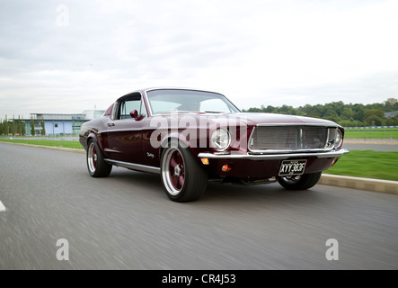 60s Ford Mustang fastback Eleanor style shot on Brooklands banking Stock Photo