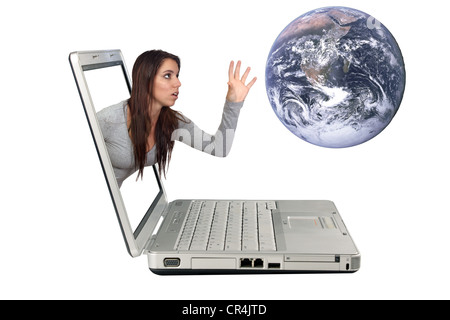 Attractive Brunette Reaching From a Laptop (2) Stock Photo