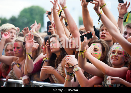 Painted Faces in the Front Row during Rizzle Kicks at Evolution Festival 2012 at Spillers Wharf in Newcastle upon Tyne UK Stock Photo