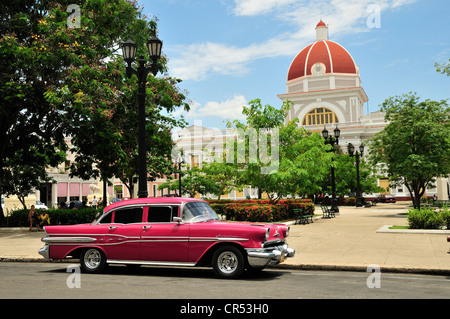 Pontiac, classic car parked in front of the Provincial History Museum next to Parque Marti park, Cienfuegos, Cuba, Caribbean Stock Photo
