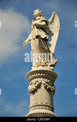 Statue of an angel on one of the monumental tombs, Colon Cemetery, Cementerio Cristóbal Colón, named after Christopher Columbus Stock Photo
