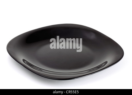 Empty black plate isolated on white Stock Photo
