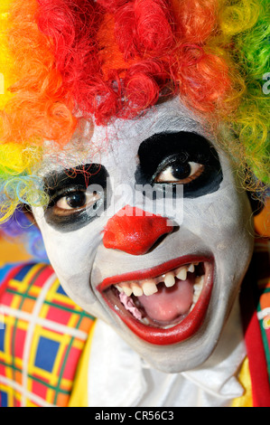 Laughing boy, dressed up as a clown, Port-au-Prince, Haiti, Caribbean, Central America Stock Photo