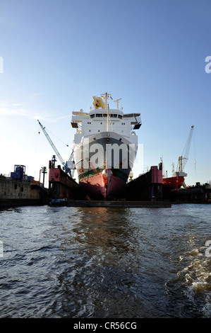 Cargo ship in a dry dock of the Port of Hamburg, Hanseatic City of Hamburg, Germany, Europe Stock Photo