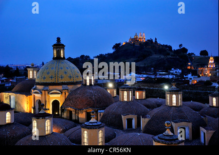 Roof of the Convento de San Gabriel monastery at night in front of the church of Iglesia Nuestra Senora de los Remedios on the Stock Photo