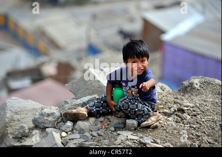 Little boy in the slums of Amauta, Lima, Peru, South America Stock Photo