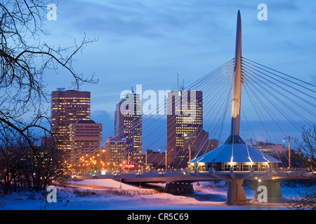 Canada, Manitoba Province, Winnipeg, downtown and Provencher Bridge by architect Gabourey Prefontaine Perry by night Stock Photo