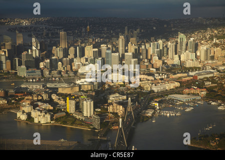 ANZAC Bridge, Pyrmont, Sydney CBD and Sydney Harbour, Sydney, New South Wales, Australia - aerial Stock Photo