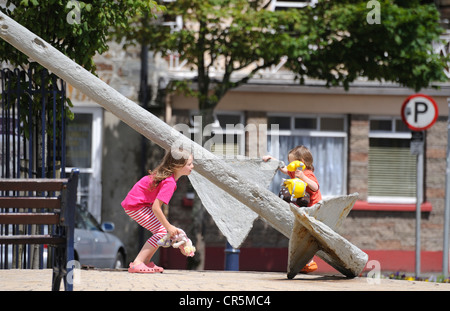 Children playing in Wolfe Tone Square, Bantry, West Cork, Republic of Ireland Stock Photo