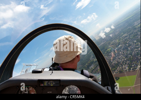 Pilot in a glider making a turn, Grevenbroich, North Rhine-Westphalia, Germany, Europe Stock Photo