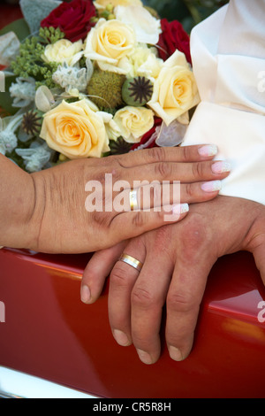 Wedding, bridal bouquet on a Cadillac Stock Photo