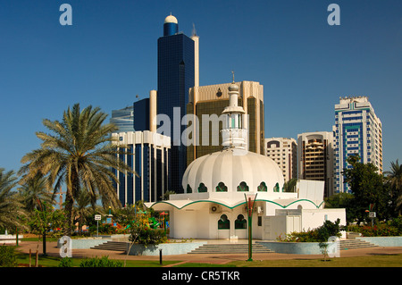 Modern mosque in front of skyscrapers in Abu Dhabi, United Arab Emirates, Middle East Stock Photo