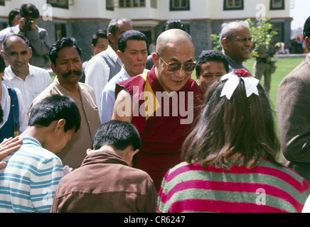 Dalai Lama 14th (Tenzin Gyatso), * 6.7.1935, Tibetan lama and politician, half length, with Tibetan children, SOS Children`s Villages, New Delhi, India, March 1991, Stock Photo