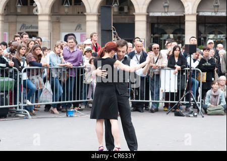 Paris France - A couple dancing tango outdoors Stock Photo