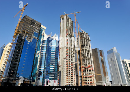 Construction of office buildings in the Financial District, Doha, Qatar, Arabian Peninsula, Persian Gulf, Middle East, Asia Stock Photo