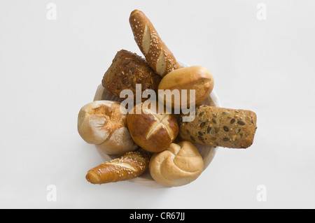 Basket with different kinds of rolls and pretzel varieties, breakfast rolls Stock Photo