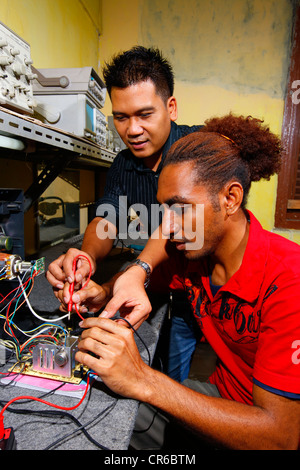 Young people being trained as electrical engineers, Sukabumi, Bandung, Java, Indonesia, Southeast Asia Stock Photo