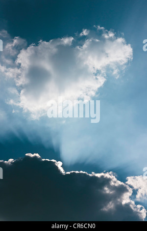 Germany, Sunbeam through cloudscape Stock Photo