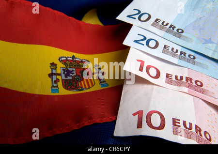 Spanish and EU flag and euro banknotes Stock Photo