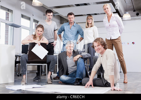 Germany, Bavaria, Munich, Men and women in office, portrait Stock Photo