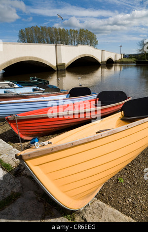 Tourist rowing boat / boats and the South Street road bridge on / over the river Frome at Wareham, Dorset. UK. Stock Photo