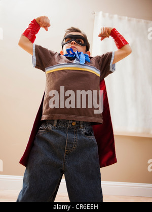 Low angle view of boy (6-7) in fancy dress costume Stock Photo