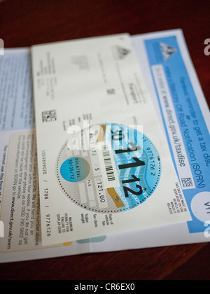 UK Vehicle tax disc and V11 renewal reminder form. Stock Photo