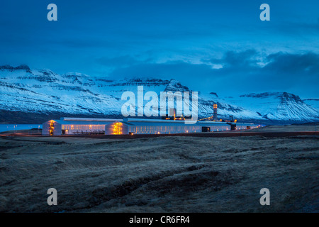 Winter light, Aluminum Smelter powered by geothermal energy, Faskrudsfjordur Iceland Stock Photo