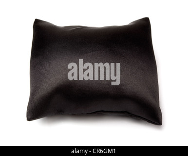 Empty black silk jewelry pillow isolated on white Stock Photo
