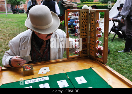 Old Faro (AKA Pharaoh or Farobank) late 17th century French gambling card game, Old West reenactment in Fort Worth, Texas, USA Stock Photo