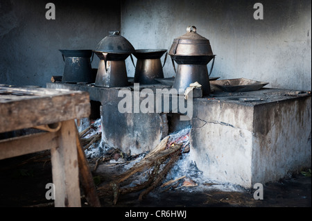 A Balinese kitchen still uses wood for cooking at a Hindu temple anniversary, called an Odalan. Stock Photo