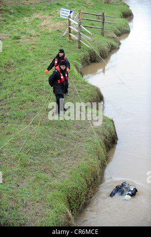 Police drivers doing an underwater search for a weapon in the River Ouse near Lewes Stock Photo