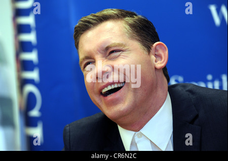 Comedian Lee Evans signing copies of his autobiography 'RoadRunner' at WHSmith in Brighton Stock Photo