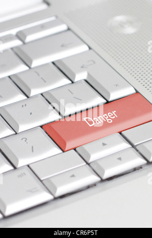 A danger key on a keyboard Stock Photo