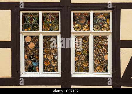 Window with old bull-glass panes on a half-timbered house, Salzmarkt street, Koenigsberg, Lower Franconia, Bavaria Stock Photo