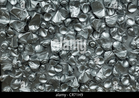 Empty, crushed spray cans, spray-painted in silver colour, in a shop window, Exeter, Devon, England, United Kingdom, Europe Stock Photo