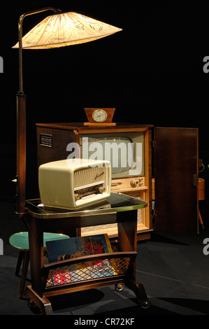 Floor lamp with side table, tv set and radio from the '50s, 2011 exhibition, Museum for Industrial Culture, Aeussere Sulzbacher Stock Photo