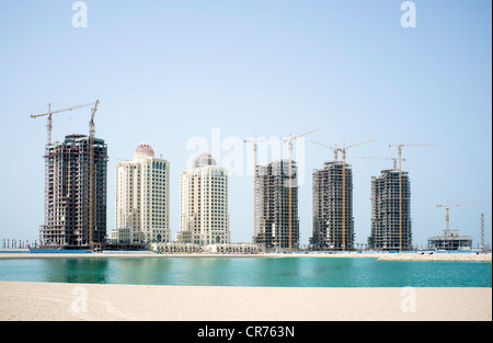 New apartment towers under construction at new Pearl Doha land reclamation property development area in Doha Qatar Stock Photo