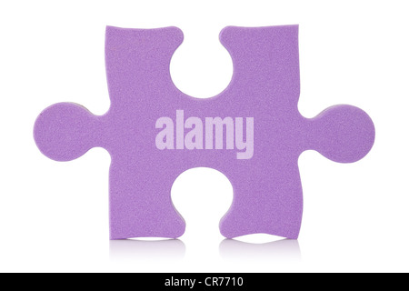 purple puzzle piece over a white background Stock Photo