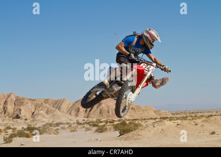 USA, California, Motocrosser jumping on Palm Desert Stock Photo