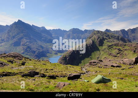 Wild camping on the Isle of Skye, with Loch Coruisk and the jagged Black Cuillin ridge in the background Stock Photo