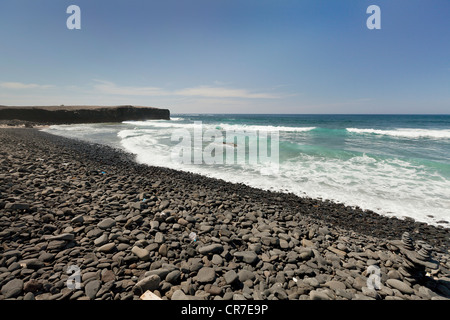Pebble beach with cairn, Punta de Jandia, southern tip of the island of Fuerteventura, Jandia Natural Park, Istmo de la Pared Stock Photo