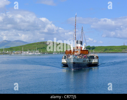 World's last sea going paddle steamer Waverley is approaching the North Pier in Oban Harbour Argyll and Bute Scotland Stock Photo