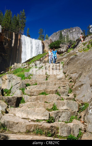 Vernal Falls and hikers on the Mist Trail, Yosemite National Park, California USA Stock Photo