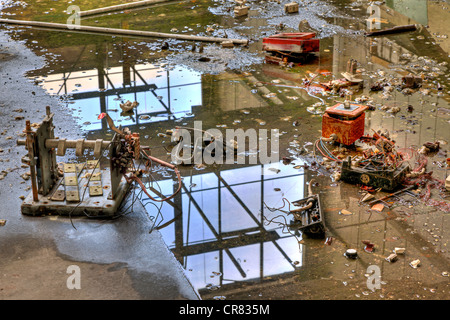 Electrical appliances, water, reflection, destruction, abandoned factory Stock Photo