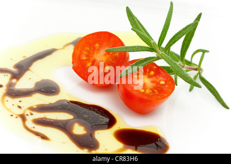 Gourmet Salad of Fresh Plum Tomatoes with Rosemary Olive Oil and Vinegar Stock Photo